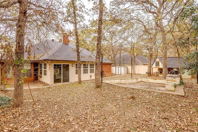 view of exterior entry with a garage