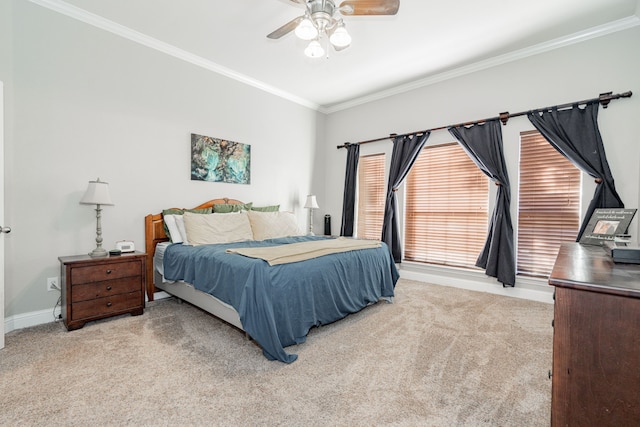 bedroom featuring light colored carpet, ceiling fan, and ornamental molding