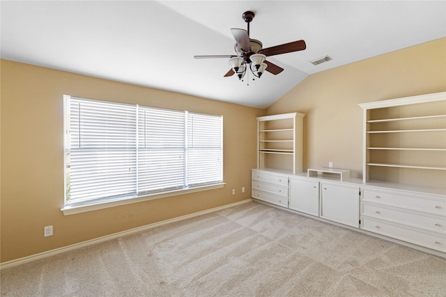 4307 Sausalito Dr, Dallas, TX 75287 - unfurnished bedroom featuring light carpet, vaulted ceiling, and ceiling fan
