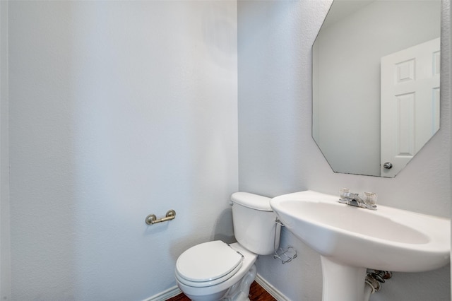 bathroom featuring toilet