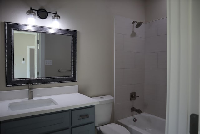 full bathroom with vanity, toilet, and tiled shower / bath