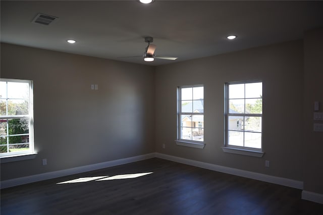 empty room featuring dark hardwood / wood-style floors and ceiling fan