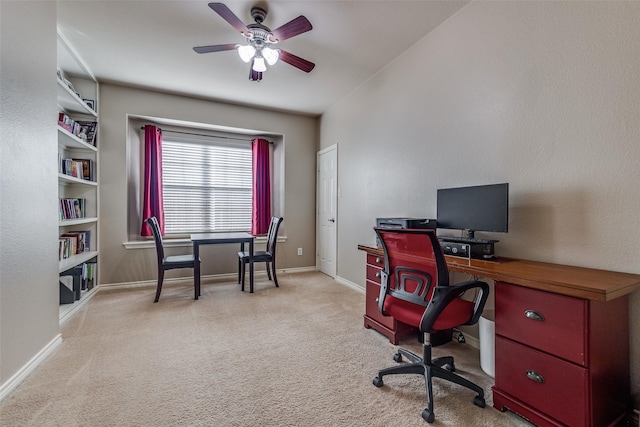 office with ceiling fan and light colored carpet