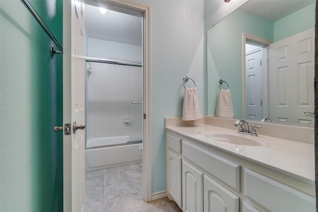 bathroom featuring vanity and combined bath / shower with glass door