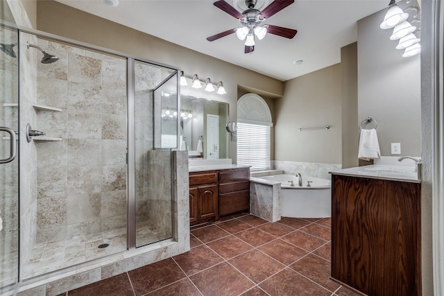 bathroom featuring plus walk in shower, tile patterned flooring, vanity, and ceiling fan