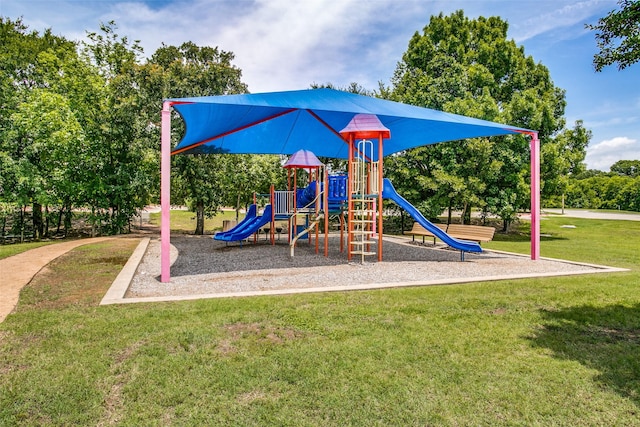 view of playground featuring a yard