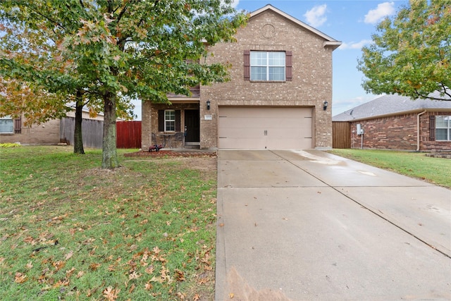 view of front property with a garage and a front lawn