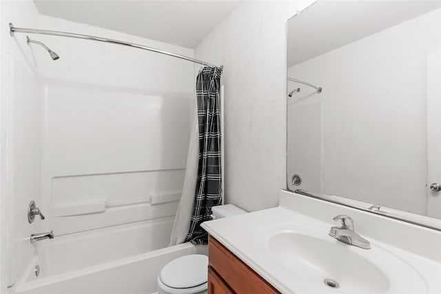 full bathroom with vanity, toilet, and shower / bath combo