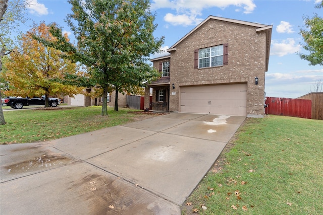 front facade featuring a garage and a front yard