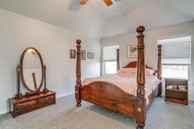 carpeted bedroom with lofted ceiling, multiple windows, and ceiling fan