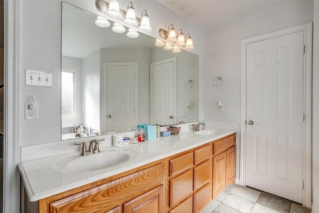 bathroom with vanity and tile patterned floors