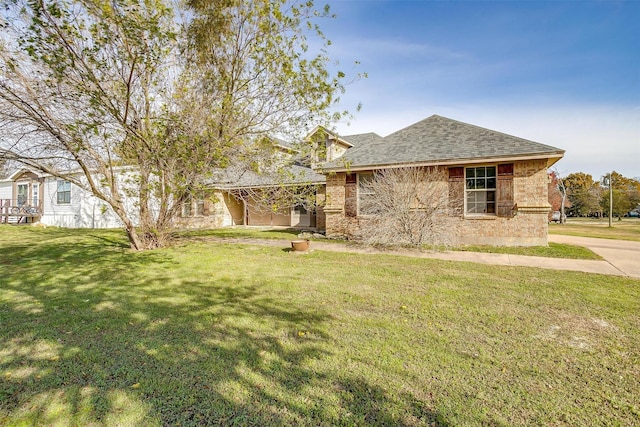 view of front of home with a front yard