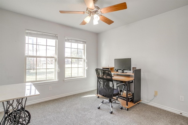 home office featuring ceiling fan and carpet floors