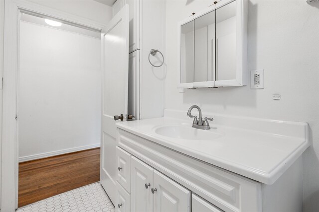 bathroom featuring tile patterned floors and vanity