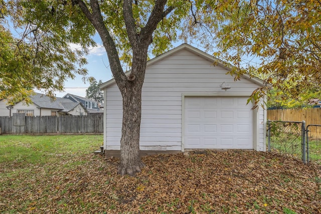 garage with a yard