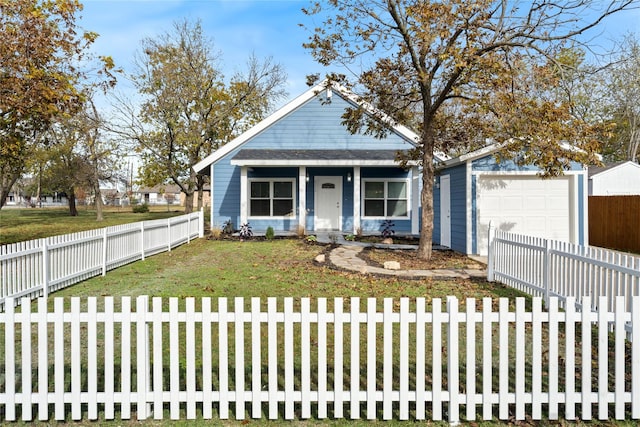 view of front facade featuring a garage and a front lawn