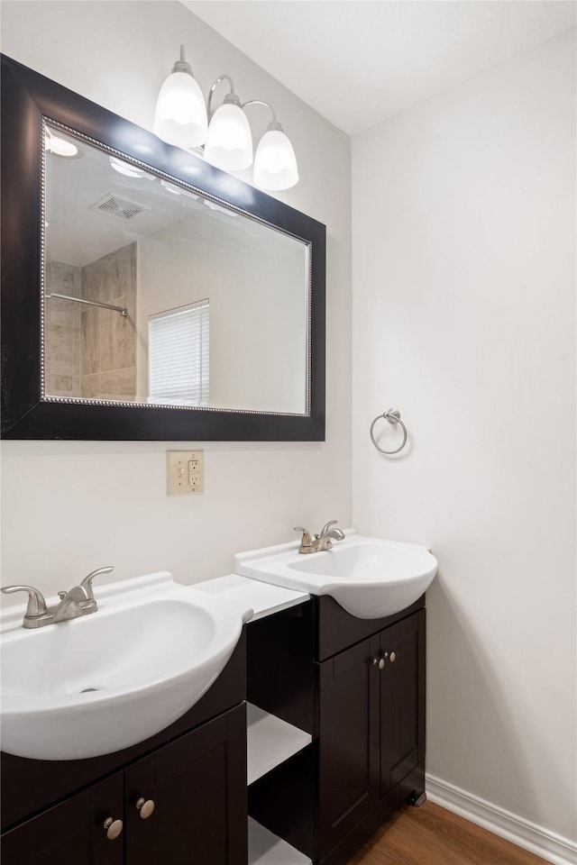 unfurnished bedroom featuring light carpet, ensuite bath, a closet, and ceiling fan