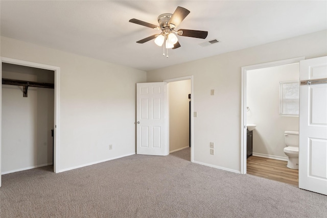 unfurnished room featuring ceiling fan and wood-type flooring