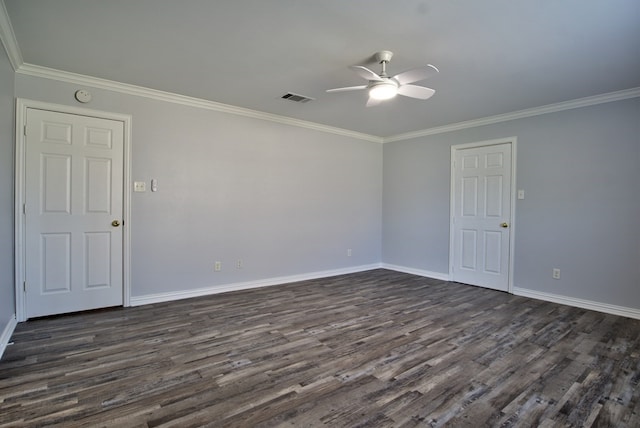 unfurnished room featuring ceiling fan, dark hardwood / wood-style flooring, and ornamental molding