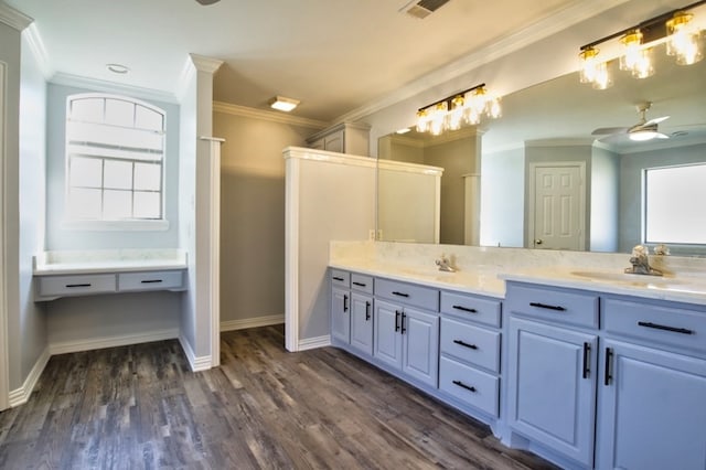 bathroom featuring hardwood / wood-style floors, crown molding, ceiling fan, and a healthy amount of sunlight