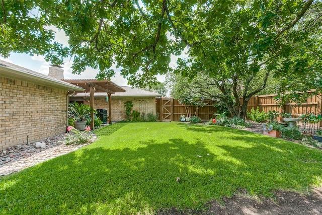 view of yard with a pergola