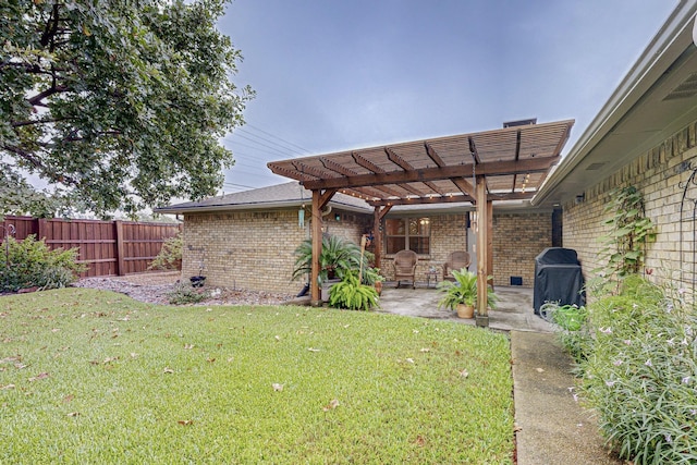 view of yard featuring a pergola and a patio