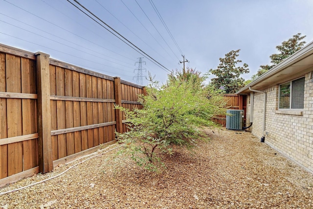 view of yard with central AC