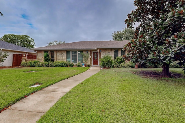 ranch-style house with a front yard