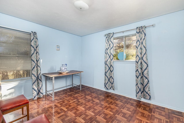 interior space featuring dark parquet flooring