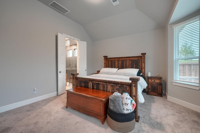 living room featuring a fireplace, plenty of natural light, light hardwood / wood-style floors, and vaulted ceiling