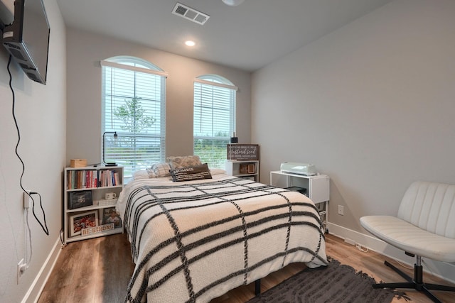 bedroom featuring hardwood / wood-style flooring