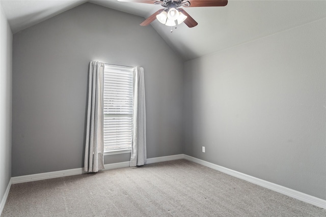 unfurnished room featuring carpet flooring, ceiling fan, and lofted ceiling