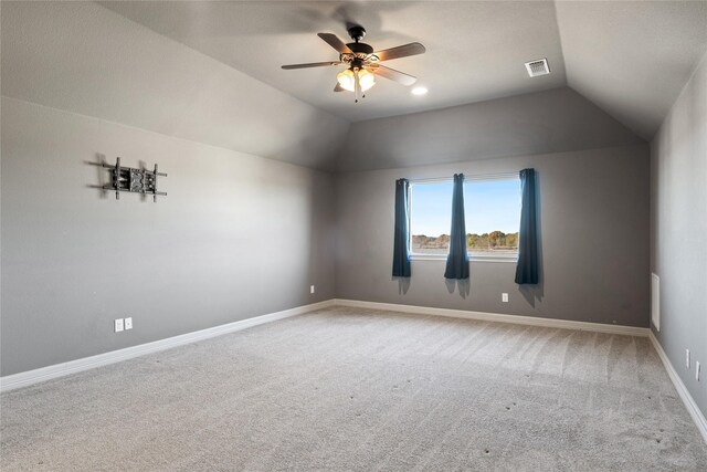 bonus room with visible vents, lofted ceiling, baseboards, and a ceiling fan