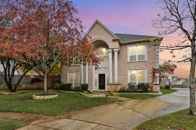 view of front of home featuring a yard