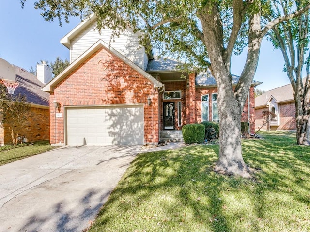 view of front of home featuring a front lawn and a garage