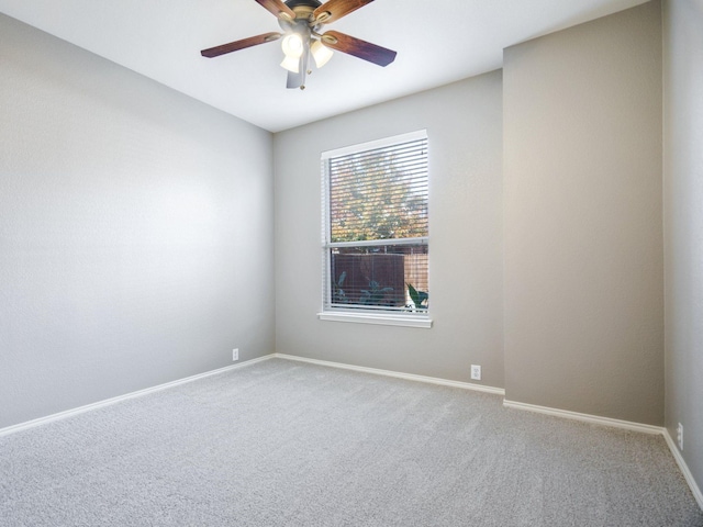 unfurnished room featuring carpet flooring and ceiling fan