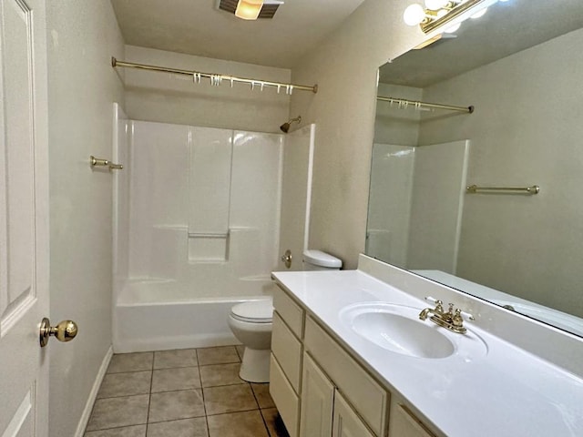 full bathroom with tile patterned floors, vanity, toilet, and washtub / shower combination