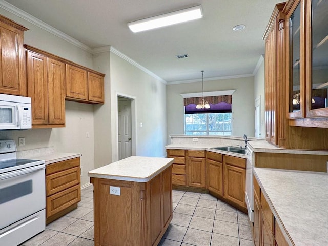 kitchen featuring pendant lighting, white appliances, an inviting chandelier, crown molding, and sink