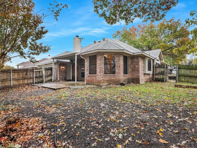 rear view of house featuring a patio area