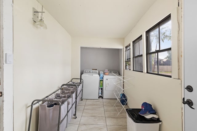 washroom with washing machine and dryer