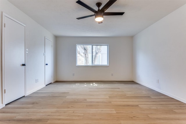 unfurnished bedroom featuring light wood-type flooring and ceiling fan