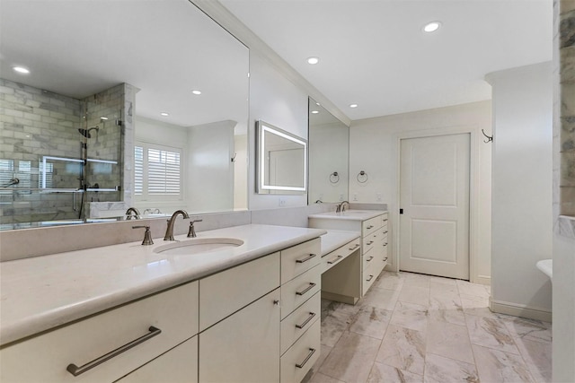 bathroom with vanity and walk in shower