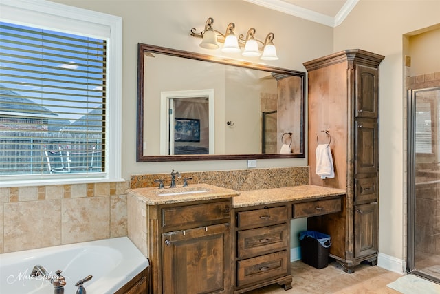 bathroom featuring plus walk in shower, vanity, tile patterned floors, and ornamental molding