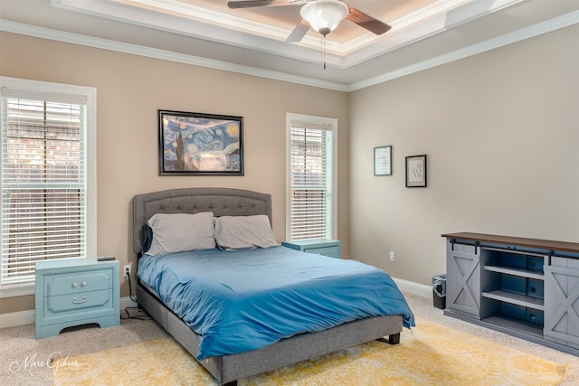 carpeted bedroom with ceiling fan and crown molding