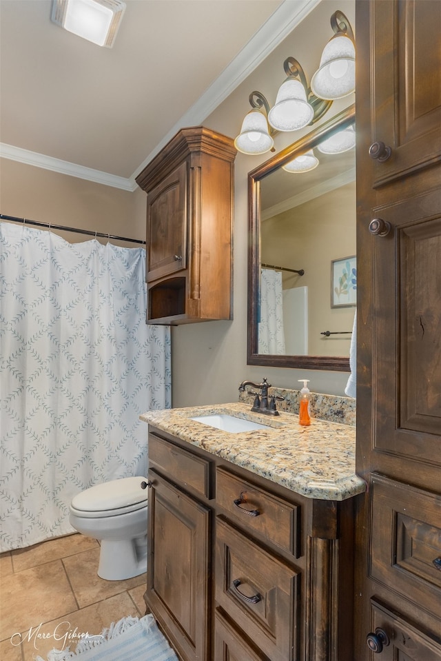 bathroom featuring tile patterned flooring, vanity, toilet, and ornamental molding