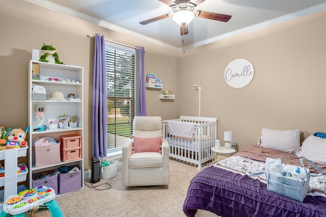 bedroom featuring light colored carpet, ceiling fan, and crown molding