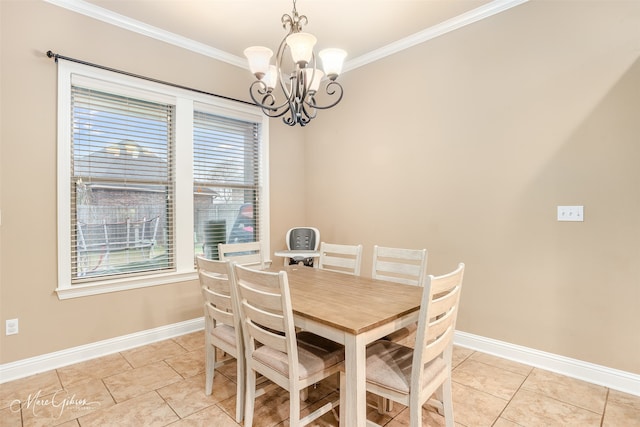 dining room with light tile patterned floors, ornamental molding, and a notable chandelier