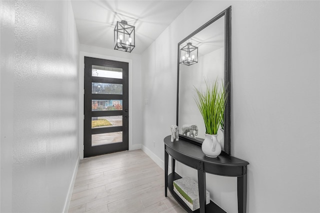 entrance foyer featuring french doors and light wood-type flooring