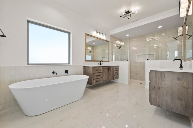 bathroom featuring tile walls, shower with separate bathtub, ornamental molding, and vanity