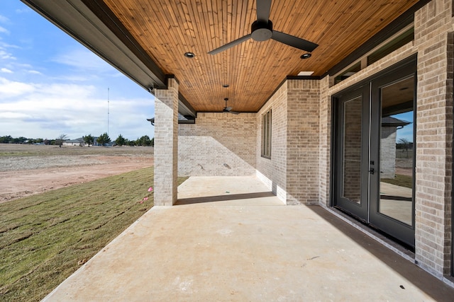 view of patio / terrace with ceiling fan and french doors